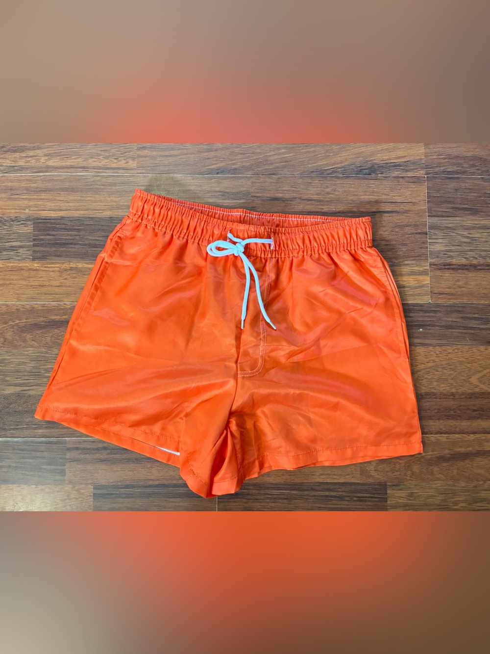 Men's Orange Swim Trunks with Duck Print That Shows When Wet